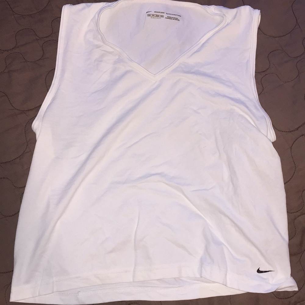 Nike dry fit seem less tennis shirt.